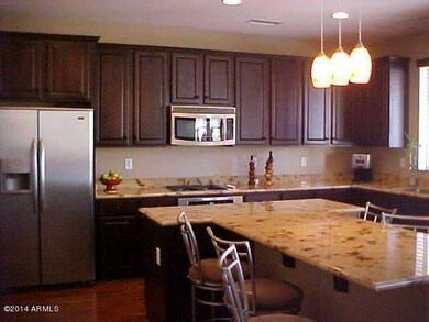 Huge Granite Island & Espresso Cabinets!