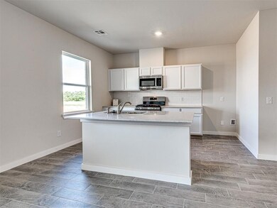 Kitchen - Large center island, designated walk-in 