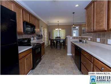 Large Galley Style Kitchen with a large Eat-In Are