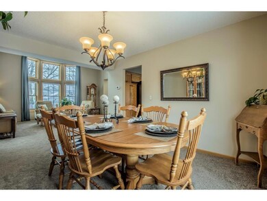 Formal dining room with serene mealtime views.