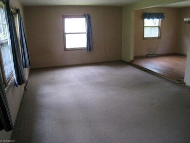 Large living and dining room off the foyer.