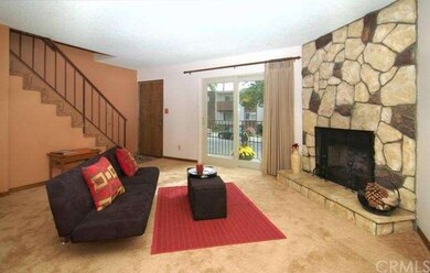 Living room with remote controlled fireplace.