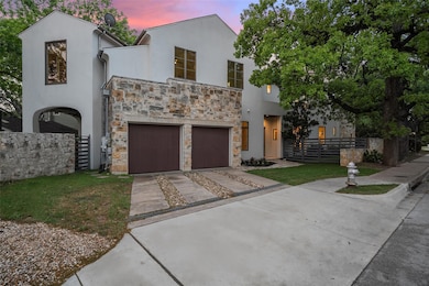 View of front of property with concrete driveway,