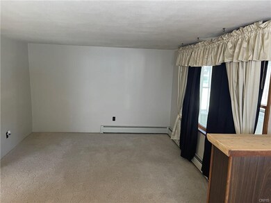 Good sized freshly painted living room