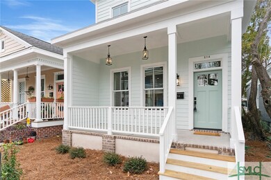 Covered front porch screams sweet tea and rocking