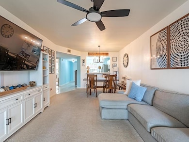 Living area featuring visible vents, light colored