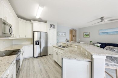 Quartz counters and stainless steel appliances.