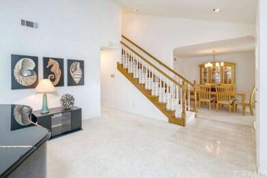 From entry . . . living room to the left, dining r