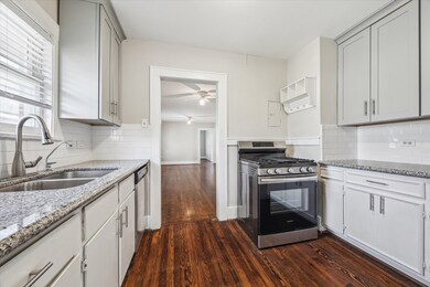 Additional view of the kitchen.