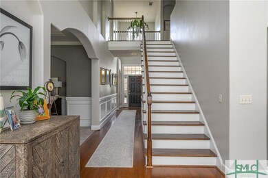 This home boasts of archways, a catwalk above the 