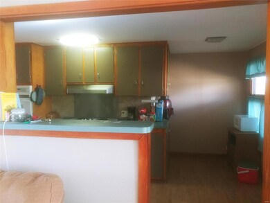 Entering kitchen from dining area
