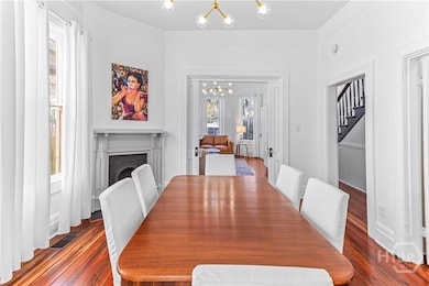 Dining Room with Open Pocket Doors to Living Room