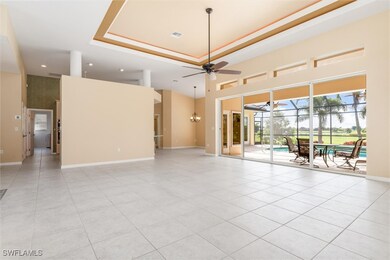 Great Room, sliders to lanai, pool, spa. in floor