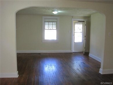 Living room looking towards front door. Original h