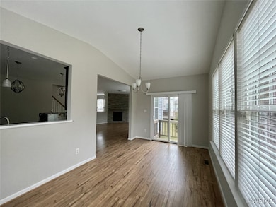 Morning Room; vaulted ceiling; laminate wood style