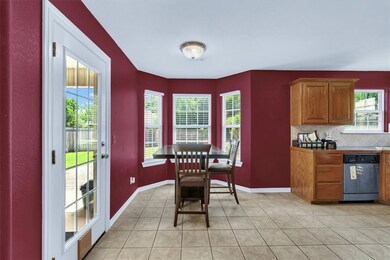Door to backyard and kitchen to your right