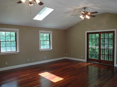 Family Room. Brazilian Hardwood Floors, 2 Skylight