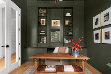 Office space featuring light wood-style floors an
