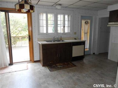 Kitchen sliding doors leading out to the secluded 