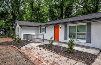 View of front of house featuring brick siding