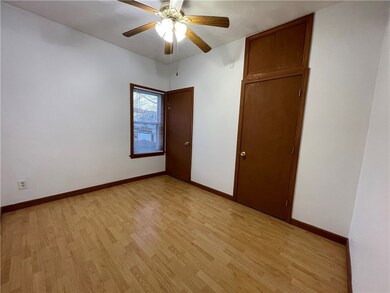 LARGE BEDROOM LOCATED IN REAR