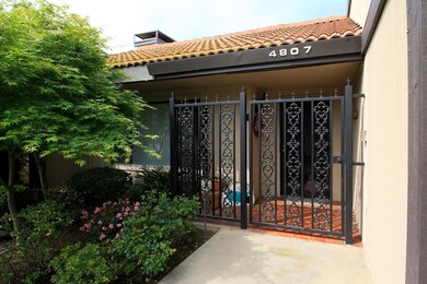 Gate around front door, where visitors have to be 