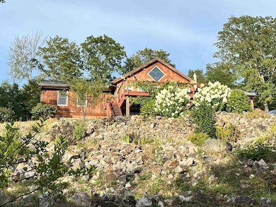 front of house , notice stained glass in center