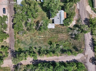 Top Aerial view shows property borders two roads t