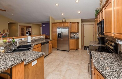Open kitchen - garage door to the back, 1/2 bath a