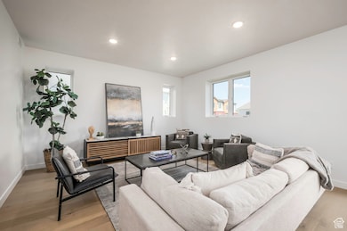 Flows beautifully from kitchen to living—just waiting for your table and a few friends. * Model Home Photo