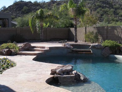 LARGE PEBBLE POOL W/SPA AND FALL