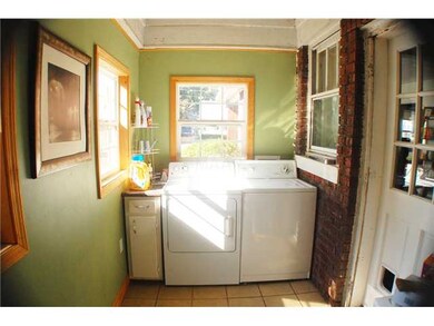 The Laundry Room off the kitchen is a room in itse