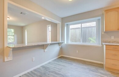 Breakfast nook on side of kitchen