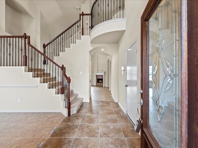 As you step into this gorgeous home, you are greeted by a grand entrance w/22' high ceiling that highlights the entire property.