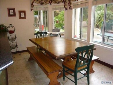 sunny breakfast nook next to kitchen & family room