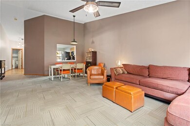 Spacious great room with newer modern ceiling fan