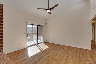 Living room view to balcony sliding doors