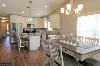 Open Kitchen/Dining area with vaulted ceiling and 