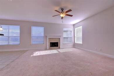 Family Area with Fireplace and Breakfast Area to t