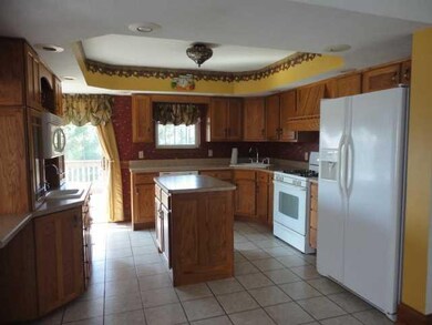 Kitchen. THE LARGE KITCHEN HAS PLENTY OF WORK SPAC