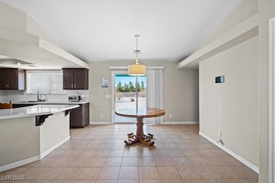 Kitchen featuring a healthy amount of sunlight, li