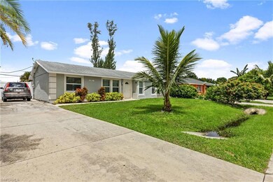Single story home featuring a front yard