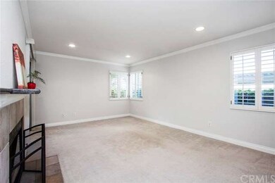 Spacious living room with recessed lights!