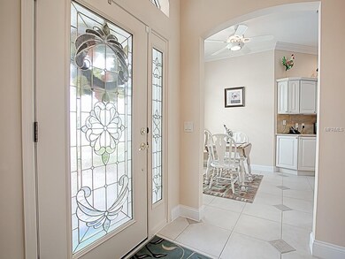 FRONT DOOR ENTRY INTO THE SPACIOUS FOYER.