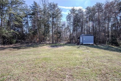 View of yard featuring a storage shed