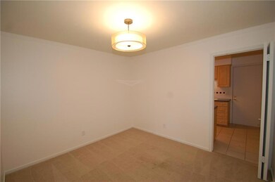 DINING AREA WITH VIEW TOWARDS KITCHEN