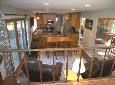 Updated kitchen has sliders to deck & patio!