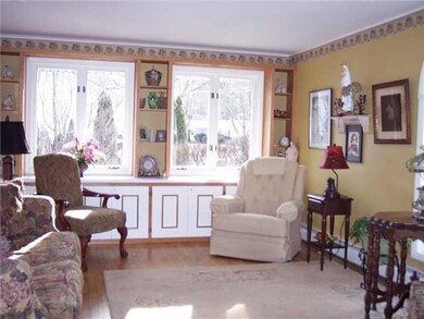 Living Room Hardwood floors and plenty of sunshine