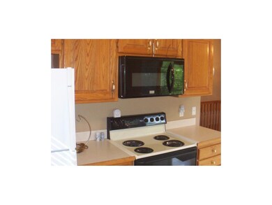 Stove, refrigerator and microwave are located for 
