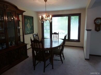 Dining room is bright and cheerful.